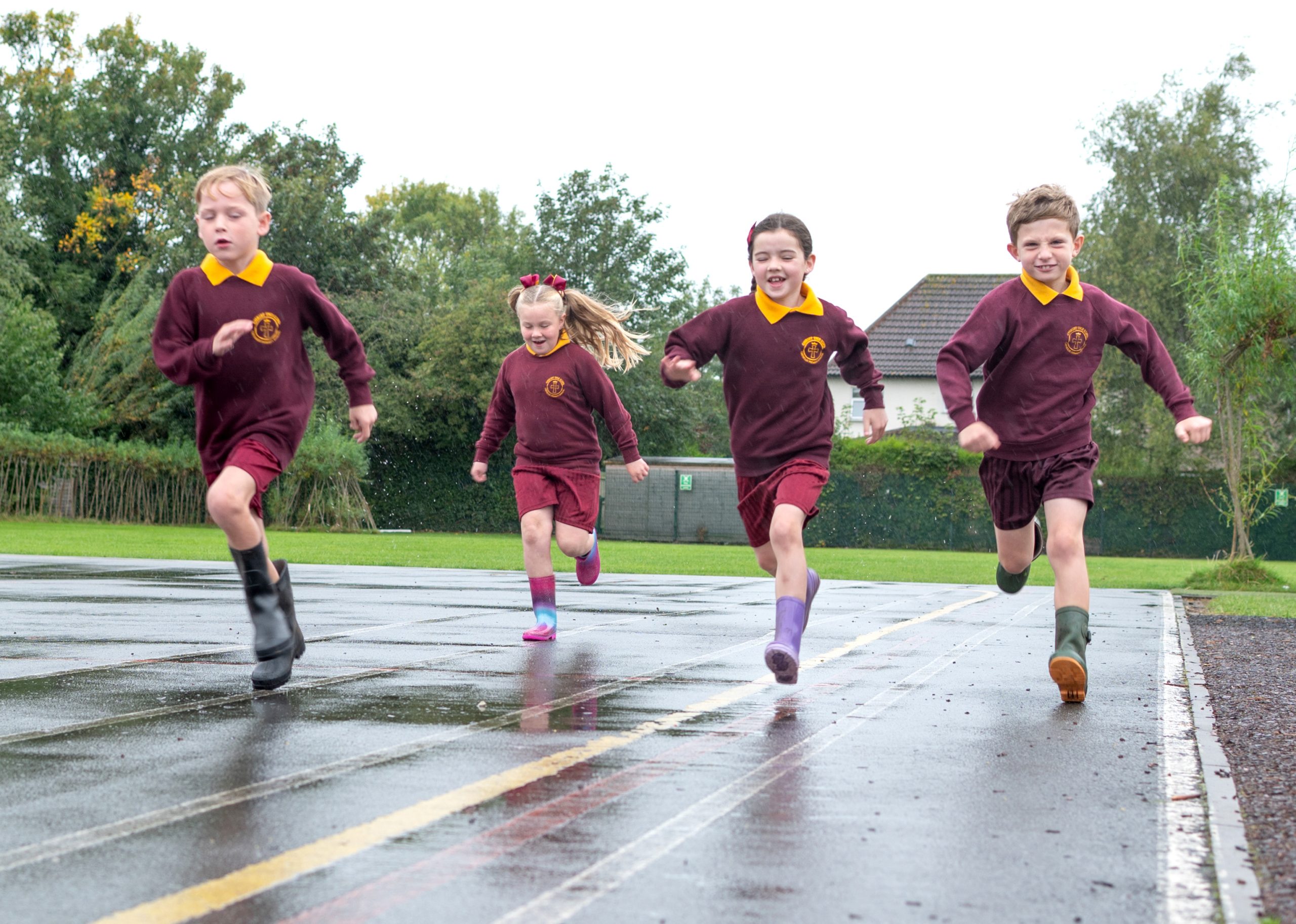 Pupils outside Christ The King Catholic Primary School